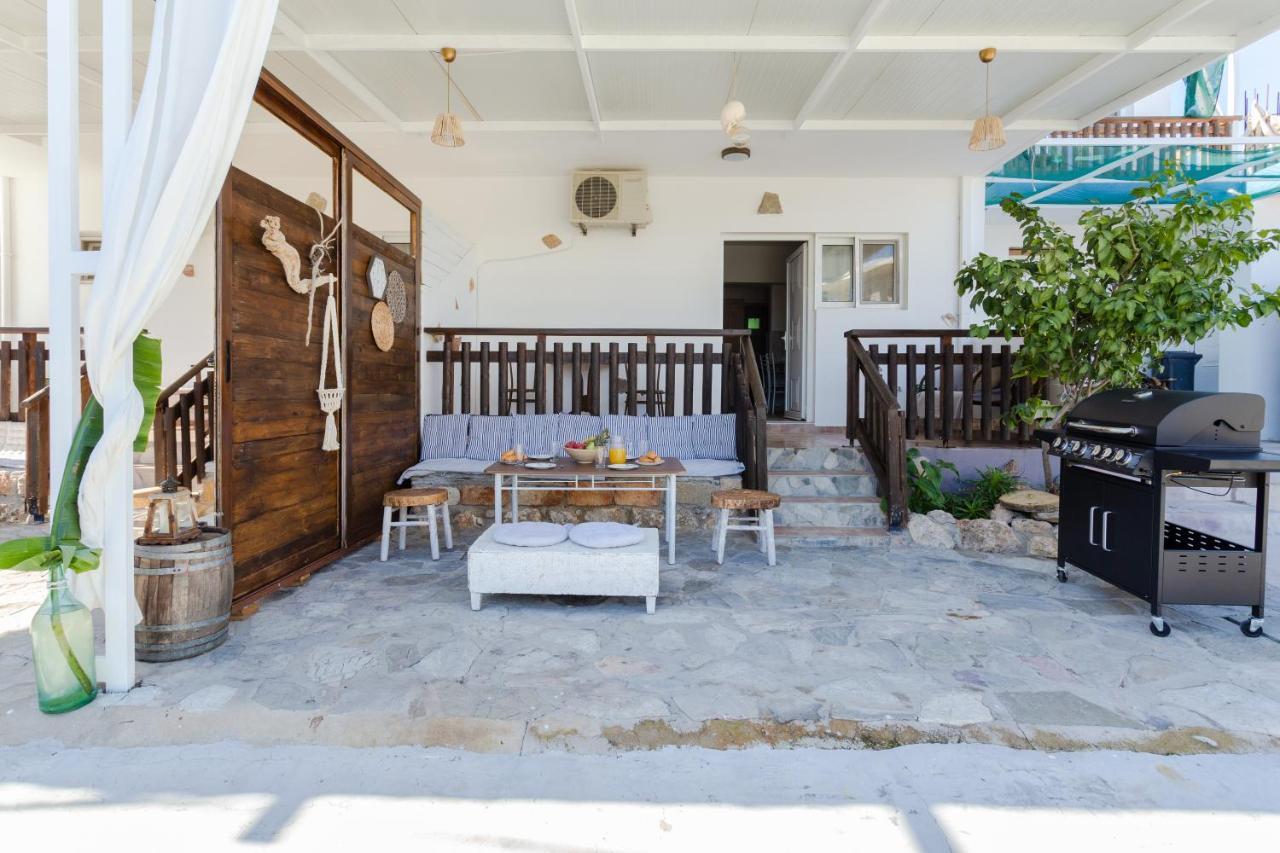 Christos Studios And Family Apartments Stegna 外观 照片