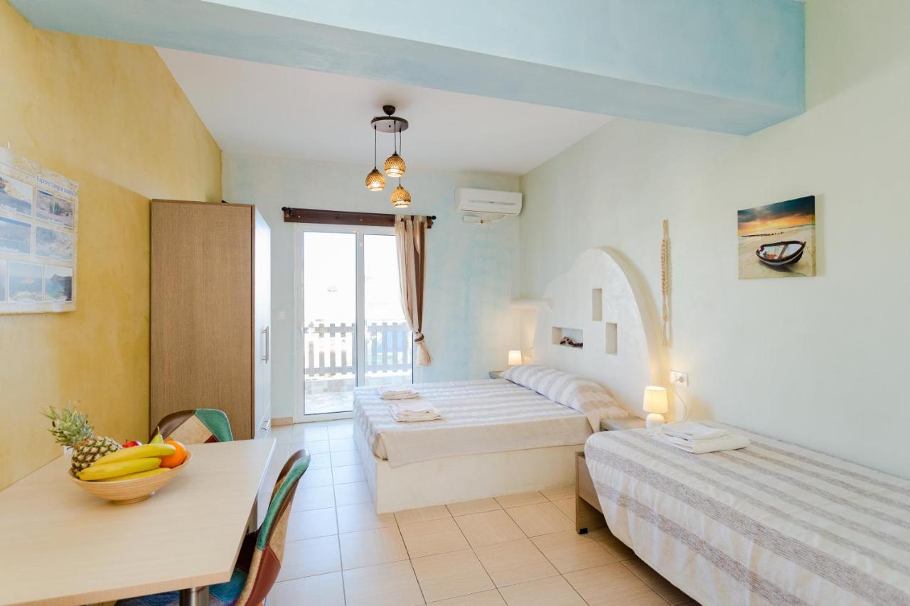 Christos Studios And Family Apartments Stegna 外观 照片